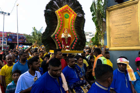 BATU CAVES, MALAYSIA - January 21, 2019: A celebration and devotee carrying kavadi preparing for ceremony prayers blessings during Thaipusam festival.のeditorial素材