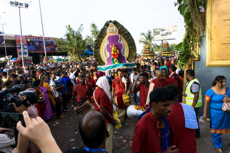 BATU CAVES, MALAYSIA - January 21, 2019: A celebration and devotee carrying kavadi preparing for ceremony prayers blessings during Thaipusam festival.のeditorial素材
