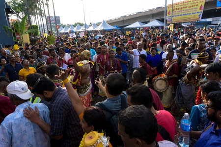 BATU CAVES, MALAYSIA - January 21, 2019: A celebration and devotee carrying kavadi preparing for ceremony prayers blessings during Thaipusam festival.のeditorial素材