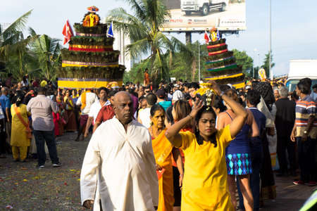 BATU CAVES, MALAYSIA - January 21, 2019: A celebration and devotee carrying kavadi preparing for ceremony prayers blessings during Thaipusam festival.のeditorial素材