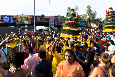 BATU CAVES, MALAYSIA - January 21, 2019: A celebration and devotee carrying kavadi preparing for ceremony prayers blessings during Thaipusam festival.のeditorial素材