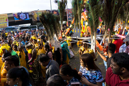 BATU CAVES, MALAYSIA - January 21, 2019: A celebration and devotee carrying kavadi preparing for ceremony prayers blessings during Thaipusam festival.のeditorial素材
