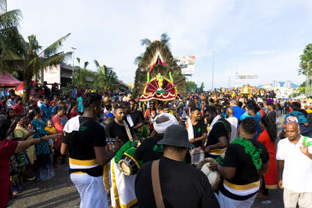 BATU CAVES, MALAYSIA - January 21, 2019: A celebration and devotee carrying kavadi preparing for ceremony prayers blessings during Thaipusam festival.のeditorial素材