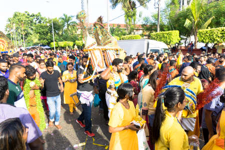 BATU CAVES, MALAYSIA - January 21, 2019: A celebration and devotee carrying kavadi preparing for ceremony prayers blessings during Thaipusam festival.のeditorial素材