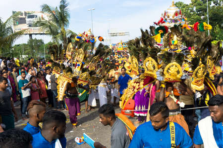 BATU CAVES, MALAYSIA - January 21, 2019: A celebration and devotee carrying kavadi preparing for...
