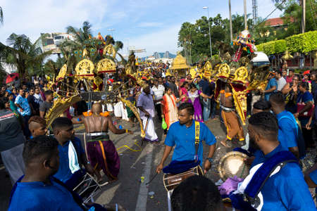 BATU CAVES, MALAYSIA - January 21, 2019: A celebration and devotee carrying kavadi preparing for ceremony prayers blessings during Thaipusam festival.のeditorial素材