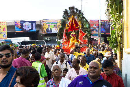 BATU CAVES, MALAYSIA - January 21, 2019: A celebration and devotee carrying kavadi preparing for ceremony prayers blessings during Thaipusam festival.のeditorial素材