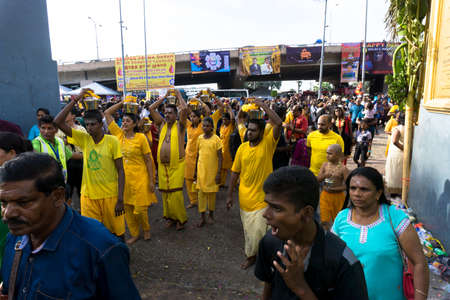 BATU CAVES, MALAYSIA - January 21, 2019: A celebration and devotee carrying kavadi preparing for ceremony prayers blessings during Thaipusam festival.のeditorial素材