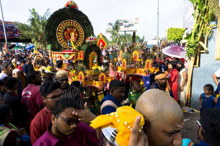 BATU CAVES, MALAYSIA - January 21, 2019: A celebration and devotee carrying kavadi preparing for ceremony prayers blessings during Thaipusam festival.のeditorial素材