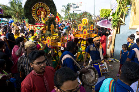 BATU CAVES, MALAYSIA - January 21, 2019: A celebration and devotee carrying kavadi preparing for...