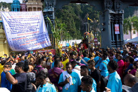 BATU CAVES, MALAYSIA - January 21, 2019: A celebration and devotee carrying kavadi preparing for ceremony prayers blessings during Thaipusam festival.のeditorial素材