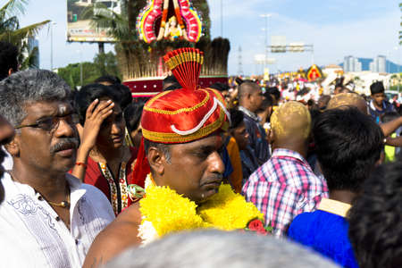 BATU CAVES, MALAYSIA - January 21, 2019: A celebration and devotee carrying kavadi preparing for ceremony prayers blessings during Thaipusam festival.のeditorial素材