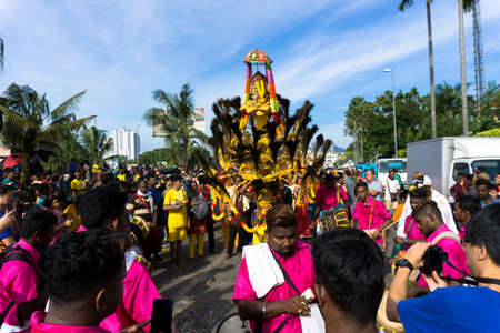 BATU CAVES, MALAYSIA - January 21, 2019: A celebration and devotee carrying kavadi preparing for ceremony prayers blessings during Thaipusam festival.のeditorial素材