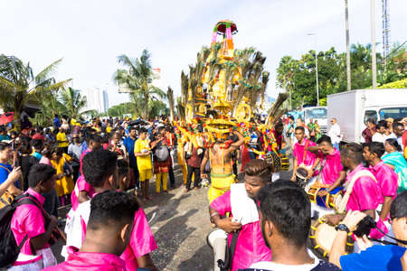 BATU CAVES, MALAYSIA - January 21, 2019: A celebration and devotee carrying kavadi preparing for ceremony prayers blessings during Thaipusam festival.のeditorial素材