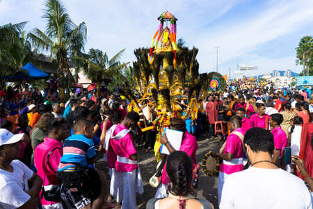 BATU CAVES, MALAYSIA - January 21, 2019: A celebration and devotee carrying kavadi preparing for ceremony prayers blessings during Thaipusam festival.のeditorial素材