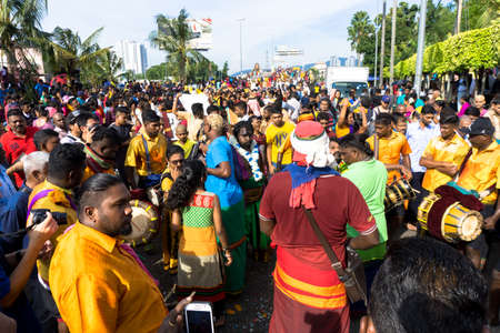 BATU CAVES, MALAYSIA - January 21, 2019: A celebration and devotee carrying kavadi preparing for ceremony prayers blessings during Thaipusam festival.のeditorial素材