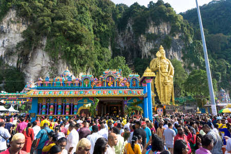 BATU CAVES, MALAYSIA - January 21, 2019: A celebration and devotee carrying kavadi preparing for ceremony prayers blessings during Thaipusam festival.のeditorial素材