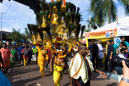 BATU CAVES, MALAYSIA - January 21, 2019: A celebration and devotee carrying kavadi preparing for...