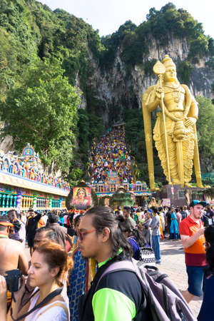 BATU CAVES, MALAYSIA - January 21, 2019: A celebration and devotee carrying kavadi preparing for ceremony prayers blessings during Thaipusam festival.のeditorial素材