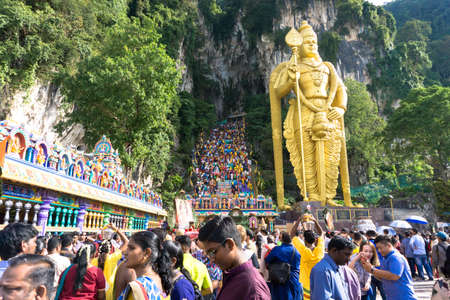 BATU CAVES, MALAYSIA - January 21, 2019: A celebration and devotee carrying kavadi preparing for ceremony prayers blessings during Thaipusam festival.のeditorial素材