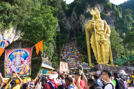 BATU CAVES, MALAYSIA - January 21, 2019: A celebration and devotee carrying kavadi preparing for ceremony prayers blessings during Thaipusam festival.のeditorial素材