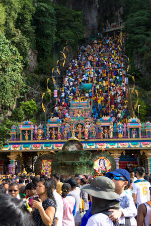 BATU CAVES, MALAYSIA - January 21, 2019: A celebration and devotee carrying kavadi preparing for ceremony prayers blessings during Thaipusam festival.のeditorial素材