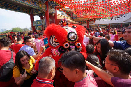 Kuala Lumpur, Malaysia - February 5, 2019: Beautiful Lion Dance during Chinese New Year celebration in Thean Hou Temple.のeditorial素材