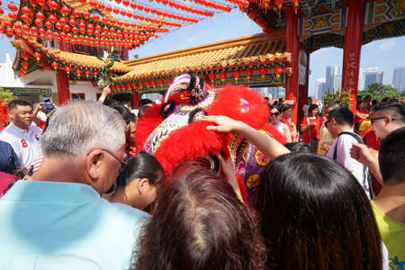 Kuala Lumpur, Malaysia - February 5, 2019: Beautiful Lion Dance during Chinese New Year celebration in Thean Hou Temple.のeditorial素材