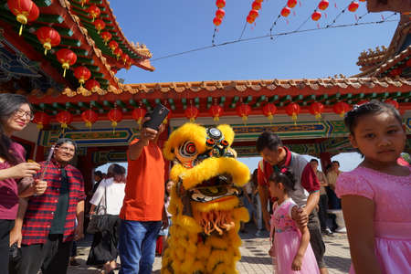 Kuala Lumpur, Malaysia - February 9, 2019: Beautiful Lion Dance during Chinese New Year celebration in Thean Hou Temple.のeditorial素材
