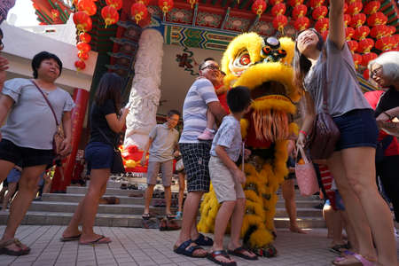 Kuala Lumpur, Malaysia - February 9, 2019: Beautiful Lion Dance during Chinese New Year celebration in Thean Hou Temple.のeditorial素材