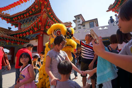 Kuala Lumpur, Malaysia - February 9, 2019: Beautiful Lion Dance during Chinese New Year celebration in Thean Hou Temple.のeditorial素材