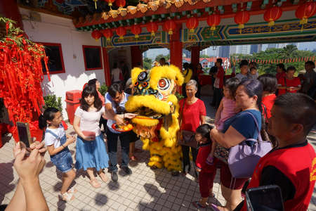 Kuala Lumpur, Malaysia - February 9, 2019: Beautiful Lion Dance during Chinese New Year celebration in Thean Hou Temple.のeditorial素材