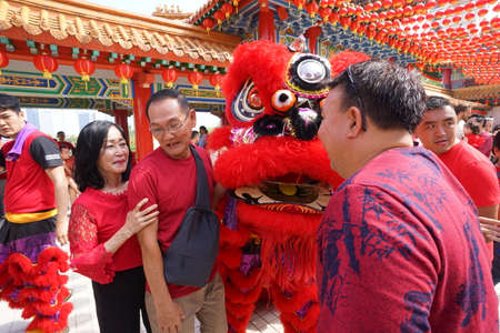Kuala Lumpur, Malaysia - February 5, 2019: Beautiful Lion Dance during Chinese New Year celebration in Thean Hou Temple.のeditorial素材