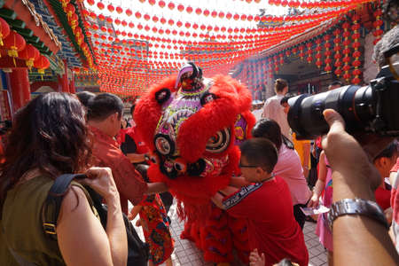 Kuala Lumpur, Malaysia - February 5, 2019: Beautiful Lion Dance during Chinese New Year celebration in Thean Hou Temple.のeditorial素材
