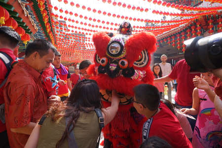 Kuala Lumpur, Malaysia - February 5, 2019: Beautiful Lion Dance during Chinese New Year celebration in Thean Hou Temple.のeditorial素材