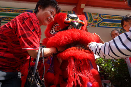Kuala Lumpur, Malaysia - February 5, 2019: Beautiful Lion Dance during Chinese New Year celebration in Thean Hou Temple.のeditorial素材