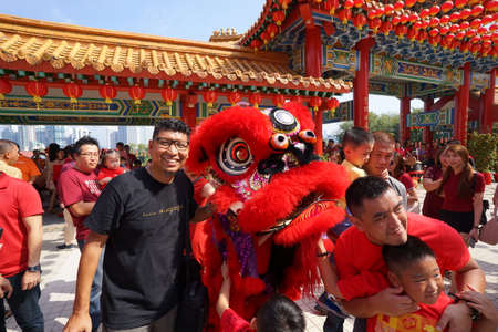 Kuala Lumpur, Malaysia - February 5, 2019: Beautiful Lion Dance during Chinese New Year celebration in Thean Hou Temple.のeditorial素材
