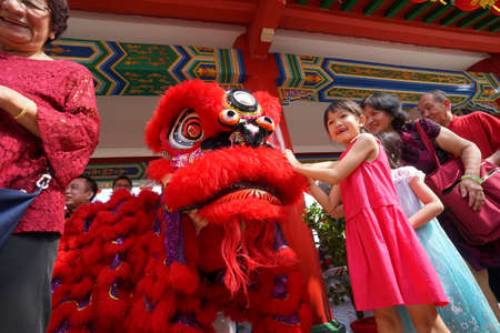 Kuala Lumpur, Malaysia - February 5, 2019: Beautiful Lion Dance during Chinese New Year celebration in Thean Hou Temple.のeditorial素材