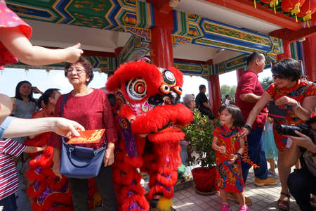 Kuala Lumpur, Malaysia - February 5, 2019: Beautiful Lion Dance during Chinese New Year celebration in Thean Hou Temple.のeditorial素材