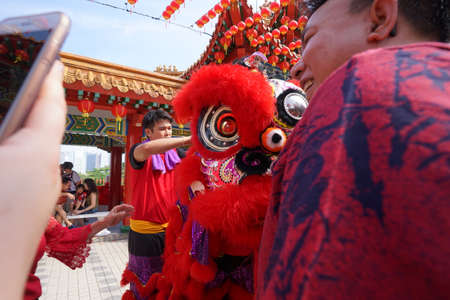 Kuala Lumpur, Malaysia - February 5, 2019: Beautiful Lion Dance during Chinese New Year celebration in Thean Hou Temple.のeditorial素材