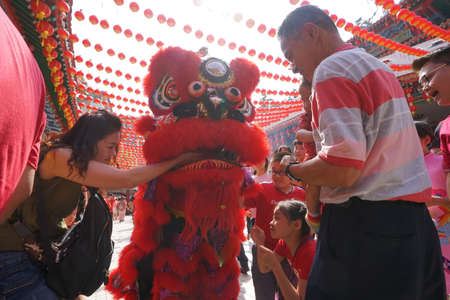 Kuala Lumpur, Malaysia - February 5, 2019: Beautiful Lion Dance during Chinese New Year celebration in Thean Hou Temple.のeditorial素材