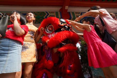 Kuala Lumpur, Malaysia - February 5, 2019: Beautiful Lion Dance during Chinese New Year celebration in Thean Hou Temple.のeditorial素材