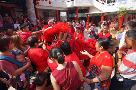 Kuala Lumpur, Malaysia - February 5, 2019: Beautiful Lion Dance during Chinese New Year celebration in Thean Hou Temple.のeditorial素材
