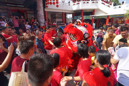 Kuala Lumpur, Malaysia - February 5, 2019: Beautiful Lion Dance during Chinese New Year celebration in Thean Hou Temple.のeditorial素材