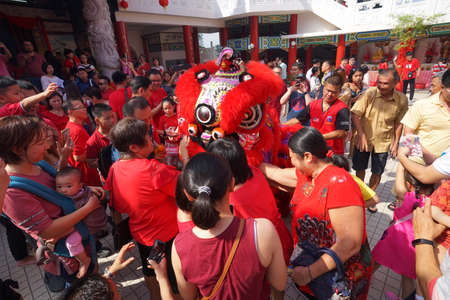 Kuala Lumpur, Malaysia - February 5, 2019: Beautiful Lion Dance during Chinese New Year celebration in Thean Hou Temple.のeditorial素材