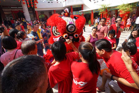 Kuala Lumpur, Malaysia - February 5, 2019: Beautiful Lion Dance during Chinese New Year celebration in Thean Hou Temple.のeditorial素材