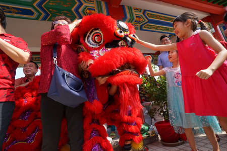 Kuala Lumpur, Malaysia - February 5, 2019: Beautiful Lion Dance during Chinese New Year celebration in Thean Hou Temple.のeditorial素材