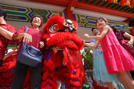 Kuala Lumpur, Malaysia - February 5, 2019: Beautiful Lion Dance during Chinese New Year celebration in Thean Hou Temple.のeditorial素材