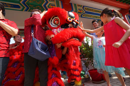 Kuala Lumpur, Malaysia - February 5, 2019: Beautiful Lion Dance during Chinese New Year celebration in Thean Hou Temple.のeditorial素材
