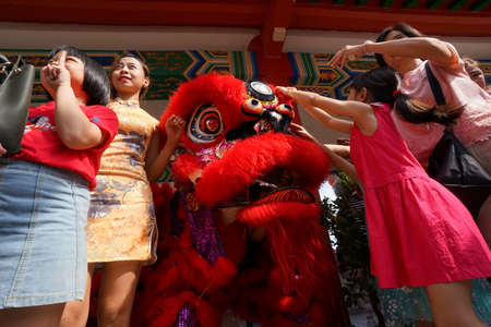 Kuala Lumpur, Malaysia - February 5, 2019: Beautiful Lion Dance during Chinese New Year celebration in Thean Hou Temple.のeditorial素材